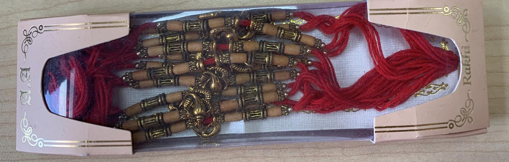 Fancy Ganesh Wooden Red Rakhi Pack of 12